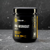 Container with green apple flavour pre-workout supplement